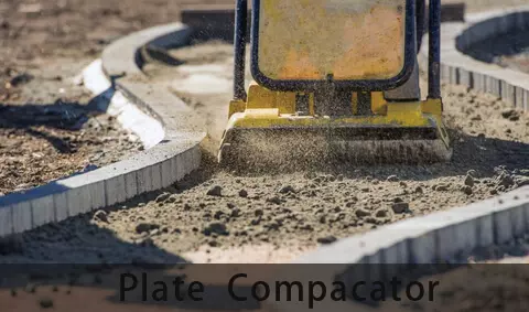 O concreto é compactado com placa compactadora.jpg